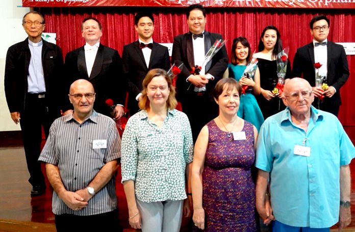 The singers of the Grand Opera Thailand in the back (Father Michel is far left) and the concert organizers in front.