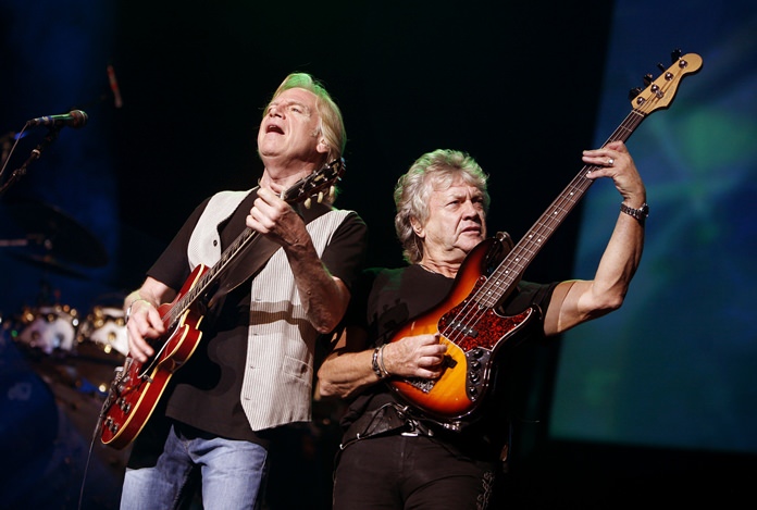 Guitarist Justin Hayward, left, and bassist John Lodge of The Moody Blues are shown performing in this Aug. 20, 2009, file photo. (AP Photo/Jason DeCrow)