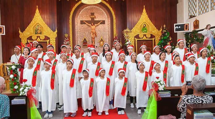 The Human Help Network Thailand Children’s Choir performs Christmas songs at St. Nikolaus Church.