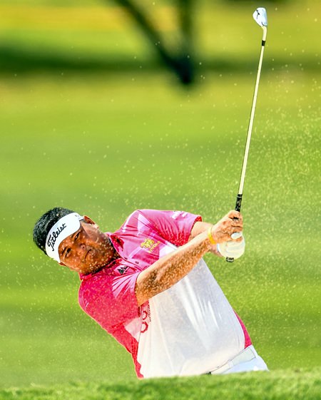 Prom Meesawat of Thailand plays a bunker shot during the final round of the Royal Cup in Pattaya.