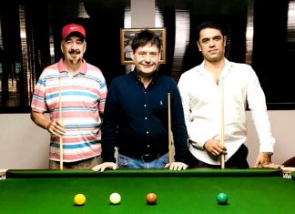 Jimmy White (centre) is flanked by Mike Tandy (left) and Infinity Snooker Club owner Meysam Amini during the opening of the club’s new star matchroom tournament table, Friday, December 29.