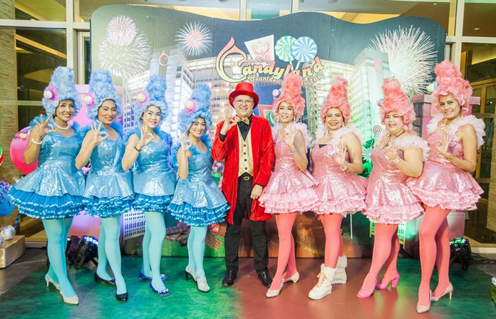 Candyland master Andre Brulhart (center) surrounded by his the sweet candies.