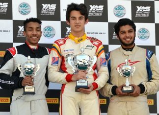 Kane Shepperd (center) stands on the podium after winning the Formula 4 South East Asia and Formula Gulf Championship race event in Abu Dhabi, Saturday, January 20.