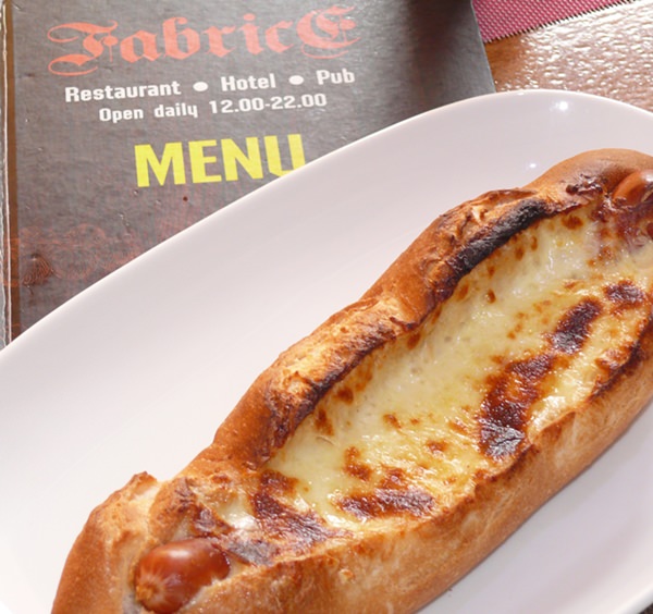 A very filling hot dog cheese baguette.