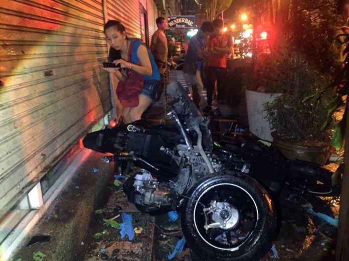 A wrong-way driver was critically injured when he collided with motorcycle taxi carrying a tourist and a Thai woman.