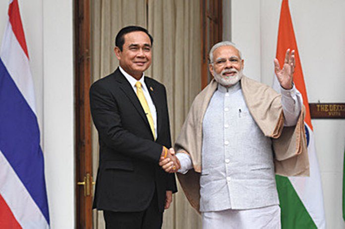 Thailand’s Prime Minister Gen Prayut Chan-o-cha, left, shakes hands with Indian Prime Minister Narendra Modi at the ASEAN-India Summit held in New Delhi, India, Thursday, Jan, 25.