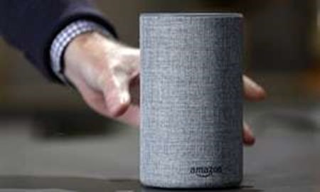 In this Wednesday, Sept. 27, 2017, file photo, a new Amazon Echo is displayed during a program announcing several new Amazon products by the company, in Seattle. (AP Photo/Elaine Thompson, File)