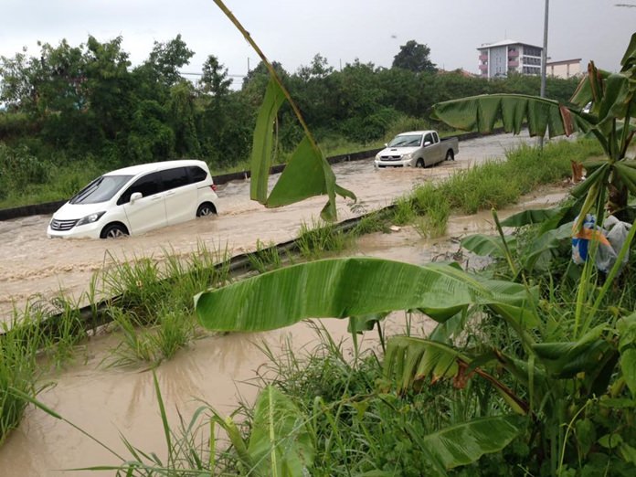 It didn’t rain for long, but it was enough to flood streets along Pattaya’s railway-parallel road.
