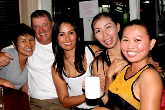 Don Lehmer (2nd left) with some fans.