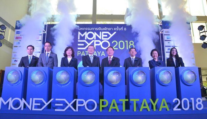 Honored guests and organizers press the magic buttons to begin the exposition.