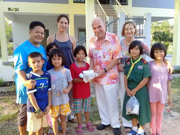 The Rotarians and visitors gather details to consider ways to support the center’s projects.