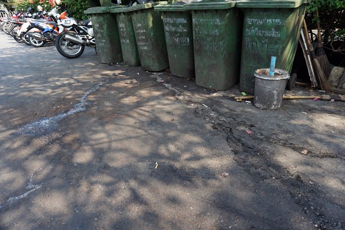 Trash bins on Pratamnak Hill have been left uncollected until the waste inside turned into a rotting mess.