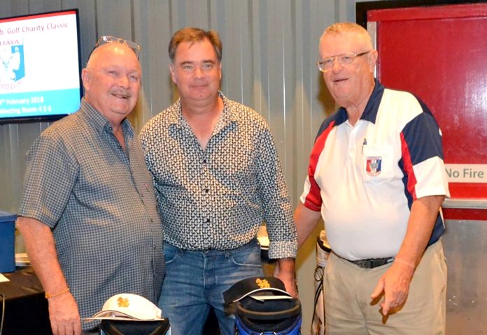 Dick Warberg (right) presents to second placed duo Stephan Ford and Samuel Gettinby.
