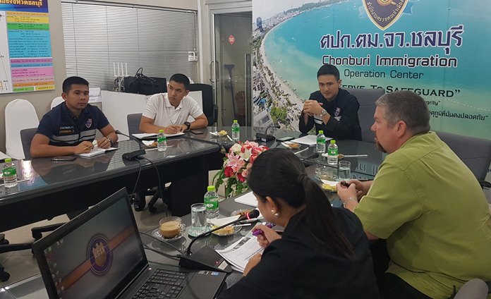 Pol. Col. Srongpride Sirisuka, head of the Jomtien Beach immigration office, and Pattaya Tourist Police commander Pol. Lt. Col. Piyapong Ensarn meet with Deputy Assistant Secretary for Defense at the US Embassy in Thailand Ed Burke.