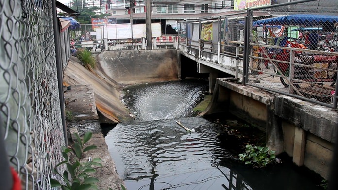 Residents say the once ‘pristine’ canal has become polluted and smelly behind Raiwanasin Market.