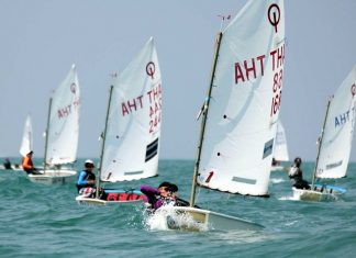 Jettawee Yongyuennam - the winner of the Optimist fleet - heads to the finish line on Day 2.