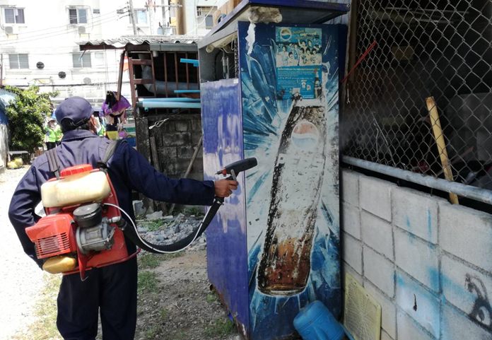 Health workers deployed in the community, spraying pesticide and distributing abate to add to any water sources to kill mozzie larvae.