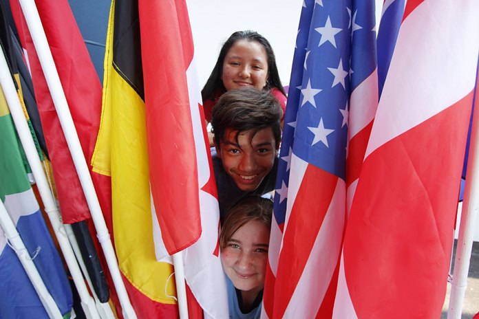 More than 40 flags were paraded by students representing their nations.