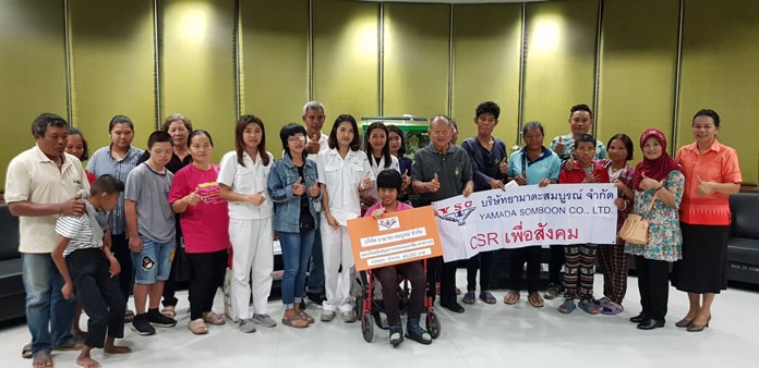 Nongprue provided a total of 600,000 baht from the Yamada Somboon Co. Ltd. to 10 local households with disabled family members.