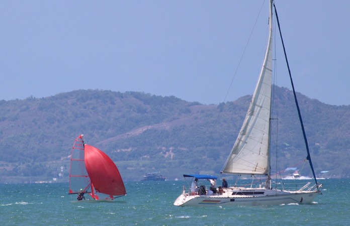 A Laser Standard and a monohull sail during the 2018 PC Classic.
