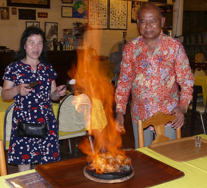 Somsak’s famous flambé chicken.