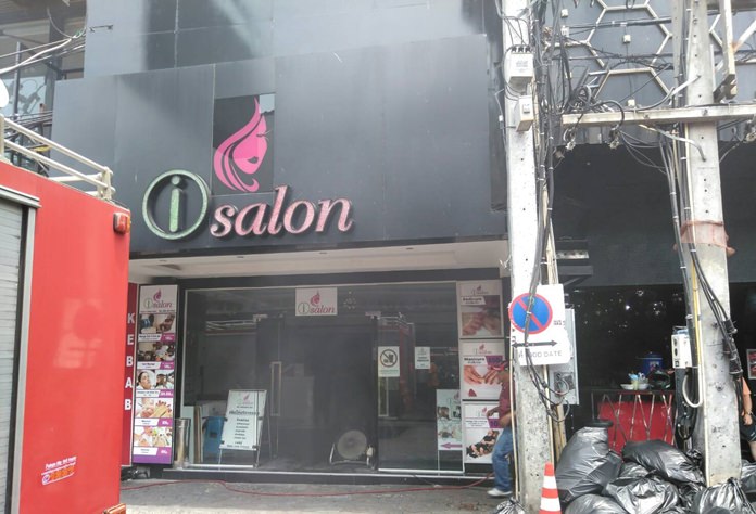 Smoke was pouring out of the Insomnia-owned iSalon on the ground floor when three fire trucks arrived midday April 6.