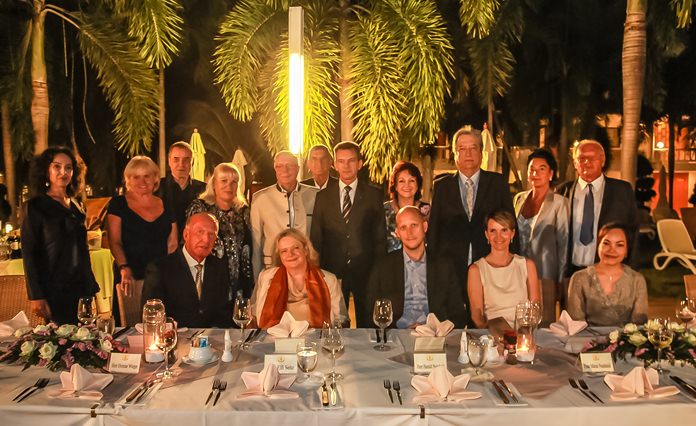 The entourage settles in for a group photo at the end of the Thai Garden Resort welcome dinner.