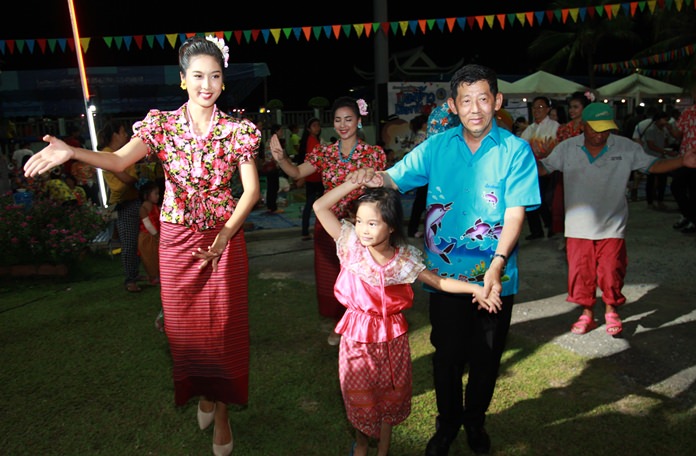 Pattaya Mayor Pol. Maj. Gen. Anan Charoenchasri dances the ramwong with family and friends during the festival.