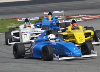 Kane Shepherd (3) leads through a turn at the Sepang circuit in Sepang, Malaysia, Saturday, April 14.