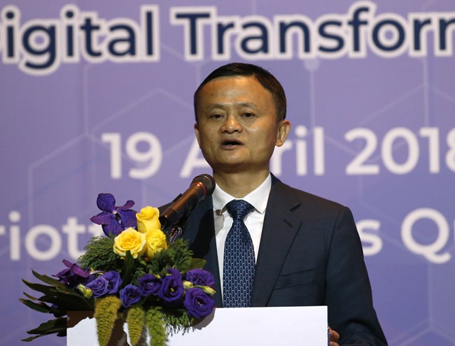 Founder and chairman of Alibaba Jack Ma delivers a speech before signing four memorandums of understanding linked to the investment in Thailand during a press conference Bangkok, Thursday, April 19. (AP Photo/Sakchai Lalit)