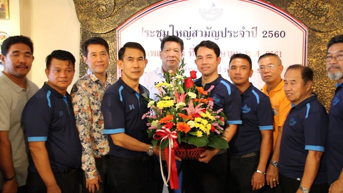 Friends and colleagues congratulate Pattaya’s ex-Mayor Itthiphol Kunplome (center, right) on his appointment as an assistant to the Tourism and Sports Minister.