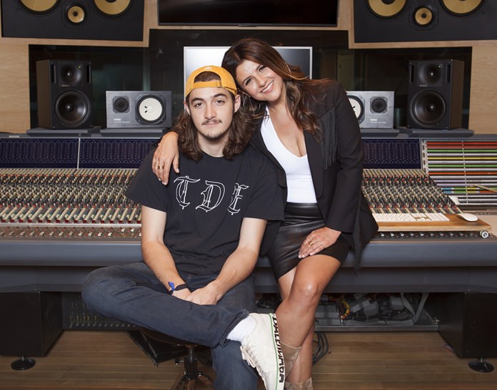 In this May 4, 2018 photo, Deacon Frey, son of the late Eagles co-founder Glenn Frey (left) and his mother Cindy Frey pose for a portrait at the Dog House Recording Studio in Los Angeles, California. (Photo by Rebecca Cabage/Invision/AP)