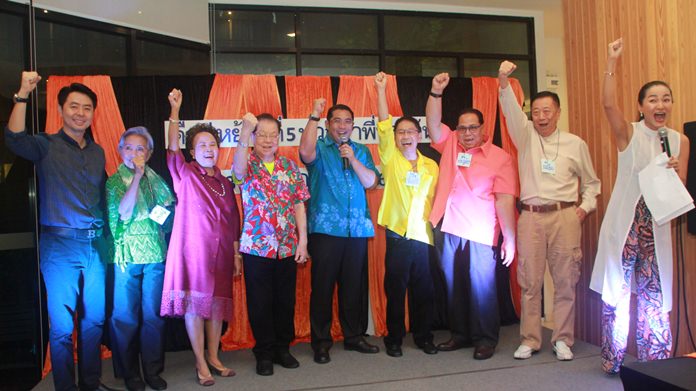 (l-r) Poramet Ngampiches, Pranee Pitaktham, Somjai Jirapat, Santsak Ngampiches, Sonthaya Kunplome, Santi Jirapat, Prasut Susiri, Pitichote Srimethakul and the effervescent MC Umaporn Ratchatawattanakul chant in unison, “Pattaya Pioneers Reunion, We are Family”.