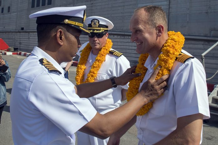 Capt. Peter Olive, Deputy Mission Commander of Pacific Partnership 2018 (PP18), receives a traditional Thai welcome upon his arrival to Thailand, May 19.