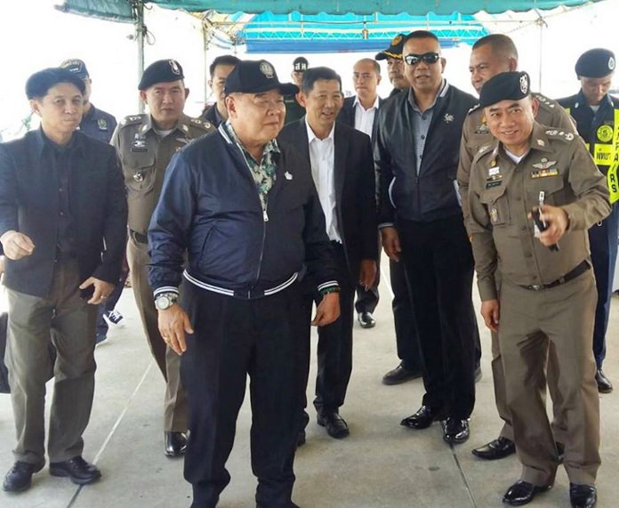 Deputy PM Gen. Prawit Wongsuwon and his entourage on an inspection tour of Bali Hai Pier.