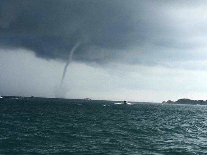 Waterspouts put on a spectacular show off Koh Larn Island.