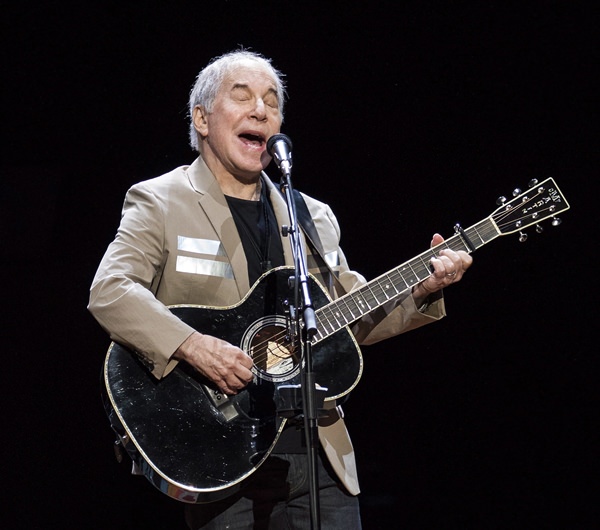 Paul Simon is shown performing in Vancouver, British Columbia, May 16, 2018. (Jimmy Jeong/The Canadian Press via AP)