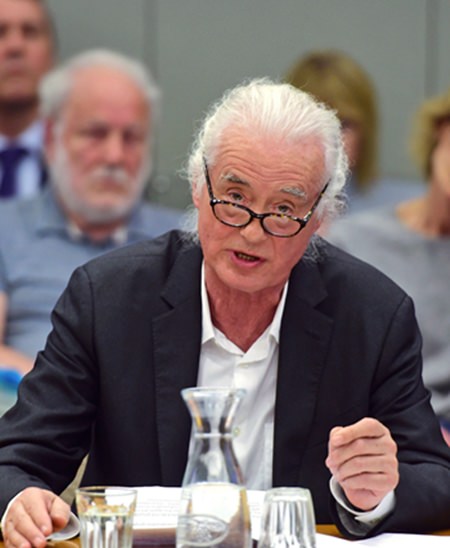 Led Zeppelin guitarist Jimmy Page speaks out during a planning permission meeting at Kensington Town Hall, in London, Tuesday May 29. (David Mirzoeff/PA via AP)