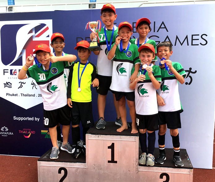 GIS medalists pose on the podium.