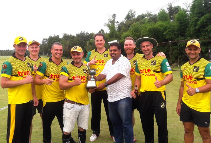 Southerners players pose with the Cup trophy after winning the Pattaya Super 8’s cricket tournament at Thai Polo Club in Pattaya, Sunday, June 10.