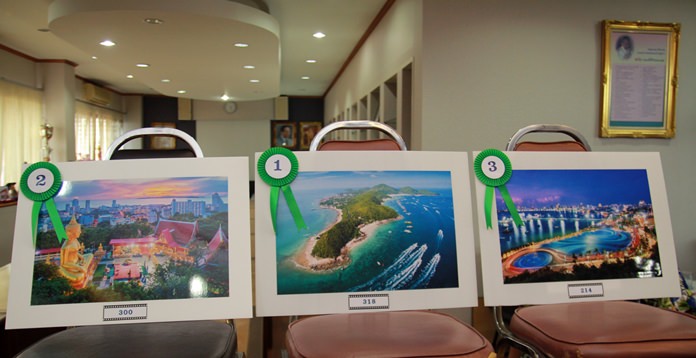 The winning photo called “Go To Koh Larn” (center) with second place “Land of Tradition” and third place “Pattaya by Night”.