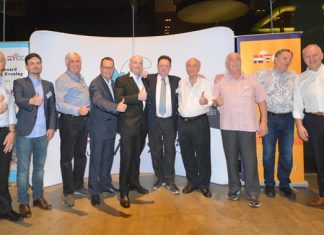 Sponsors and organisers line up for a group photo.