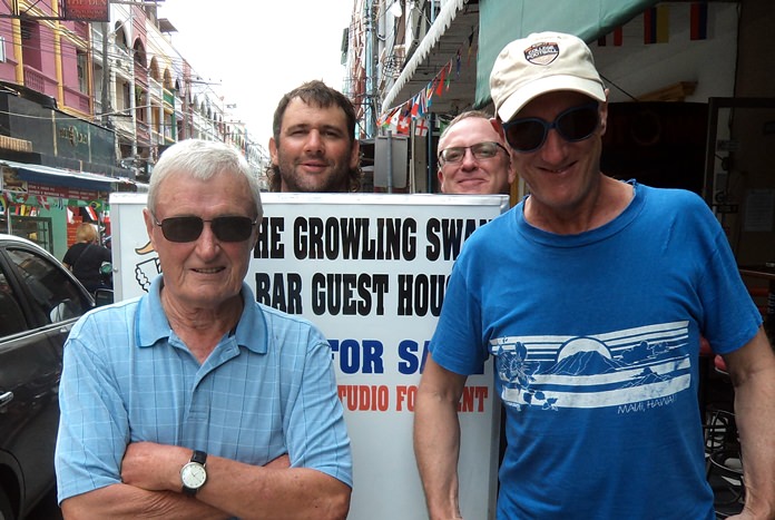 Paul Sharples (left) and Bill Steinmann (right), with Andy Zwart and Shaun McAlpine behind the sign.