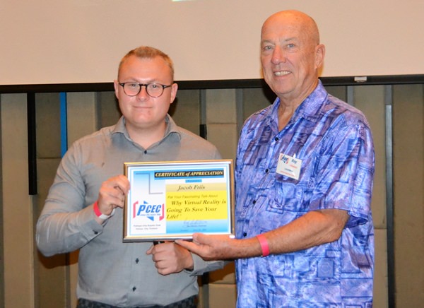 MC Roy Albiston presents Jakob Friis with the PCEC’s Certificate of Appreciation for his informative and interesting talk about Virtual Reality and its benefits.