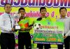 Players from Pattaya School No.1 receive their trophy and cash award after winning the under-14 category at the Pattaya futsal tournament, June 23.