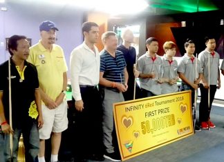 Players, referees and tournament organizers pose at the conclusion of the 6 Reds Pro-Am tournament at the Infinity Snooker Club in Pattaya, Saturday, June 30.