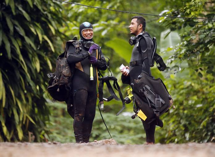 Thai rescuers prepare for diving July 3, after the 12 boys and their soccer coach were found alive. (AP Photo/Sakchai Lalit)