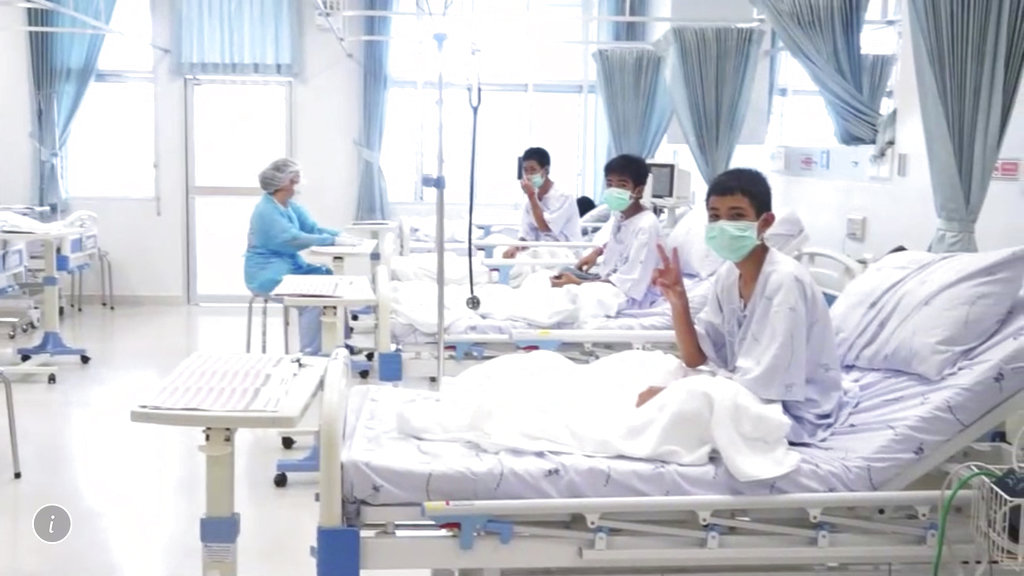 In this image made from video, three of the 12 boys are seen recovering in their hospital beds after being rescued along with their coach from a flooded cave in Mae Sai, Chiang Rai province, Wednesday, July 11. (Thailand Government Spokesman Bureau via AP)