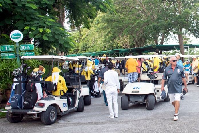 Golfers and caddies prepare before the start of the VFW’s 3rd Annual Charity Golf Tournament at Emerald Golf Club, Saturday, July 21.