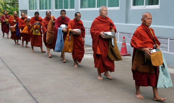 The Abbot leads the nine monks.